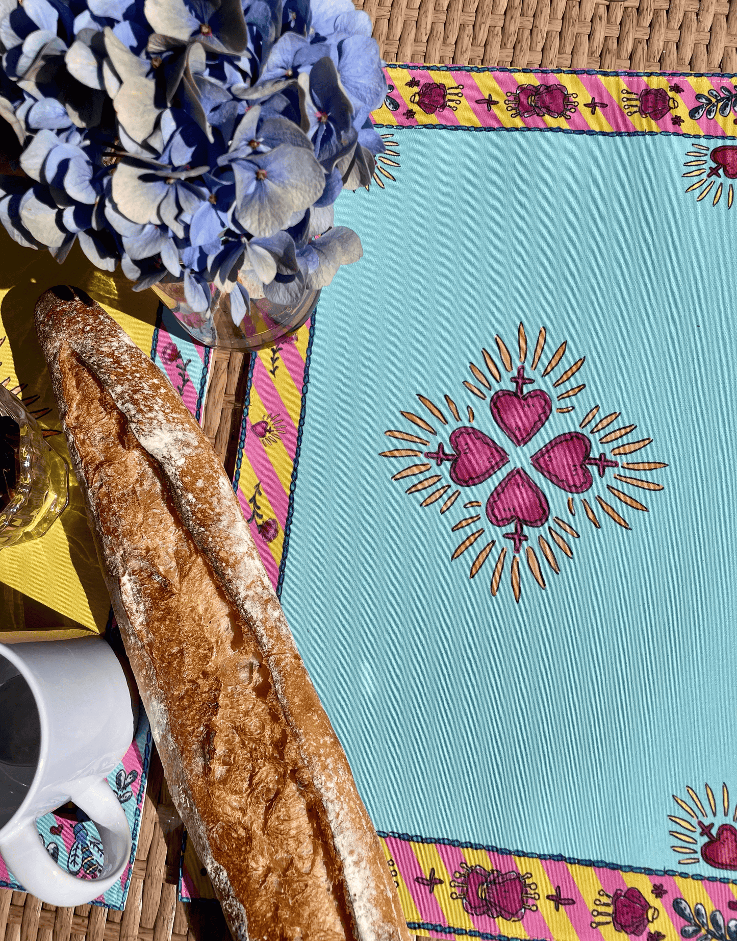 Sets de table – Tissu anti-tâches –
Motifs cœur sacré –
Fond uni turquoise –