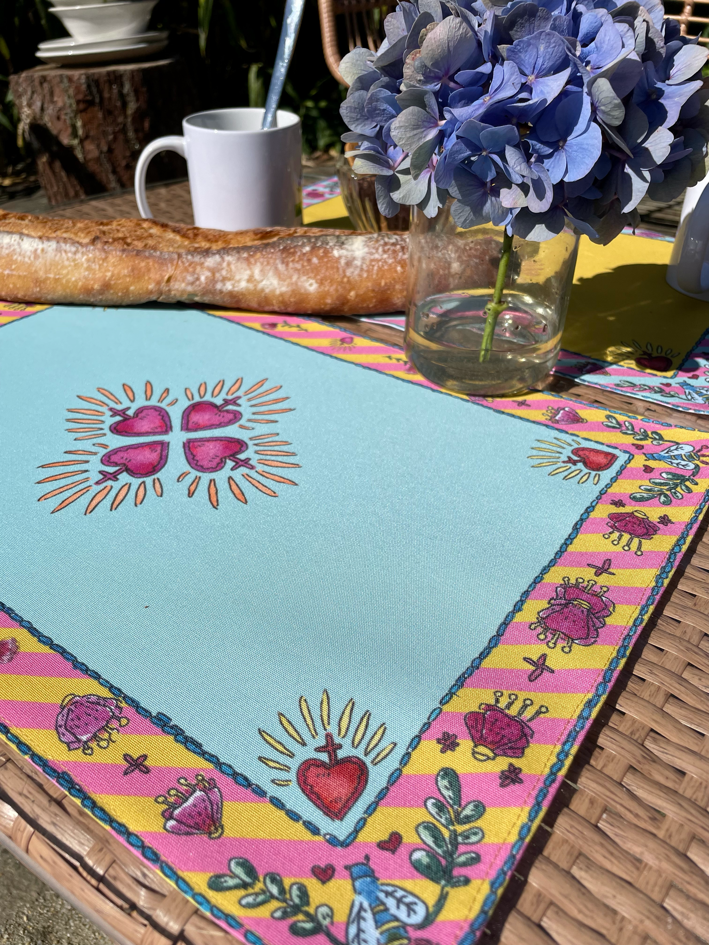 Sets de table – Tissu anti-tâches –
Motifs cœur sacré –
Fond uni turquoise –