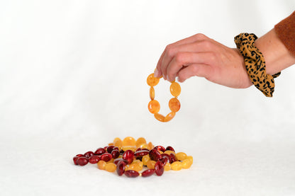 Bracelet couleur bordeaux et ambre de Clarance Bijoux de perle en résine